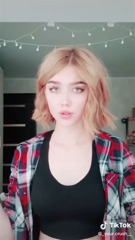 Tiktok User Yourcrushh Squeezing Her Covered Clothed Boobs Together With Her Arms Wearing