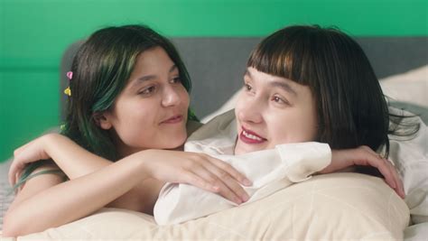 A Lovely Lesbian Couple Are Kissing And Hugging Each Other While Relaxing At The Bedroom Videos