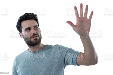 Man Pretending To Touch An Invisible Screen Stock Photo Download