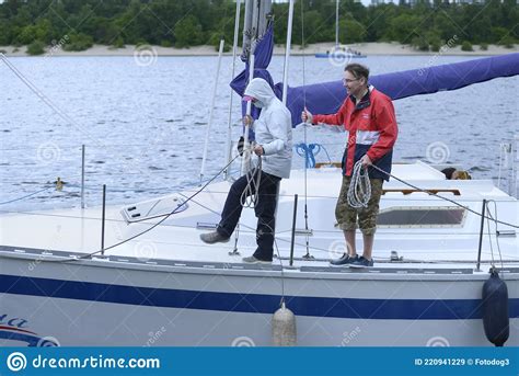 Crew Yachtsmen Of A Sailing Yacht Conducting A Flanking Manoeuvre Editorial Image ...