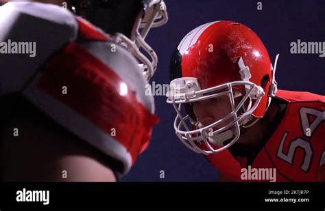 two american football players fight Stock Video Footage - Alamy