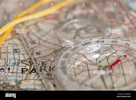 Compass on an Ordnance Survey map Stock Photo - Alamy