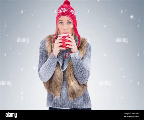 Blonde In Winter Clothes Smiling At Camera On Vignette Background Stock