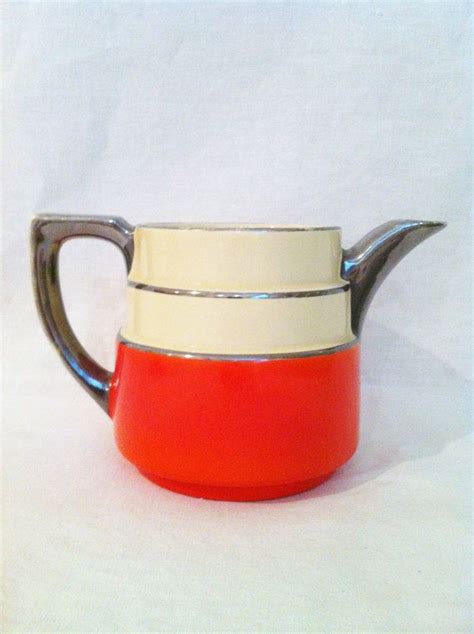 Vintage Ceramic Pottery Pitcher Coorsite Orange Yellow Silver Etsy Ceramic Pottery Ceramics