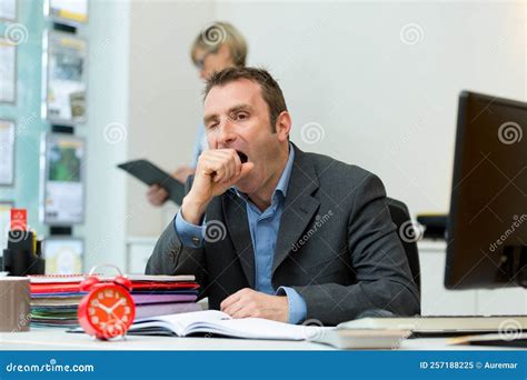 Business man bored at work stock image. Image of people - 257188225