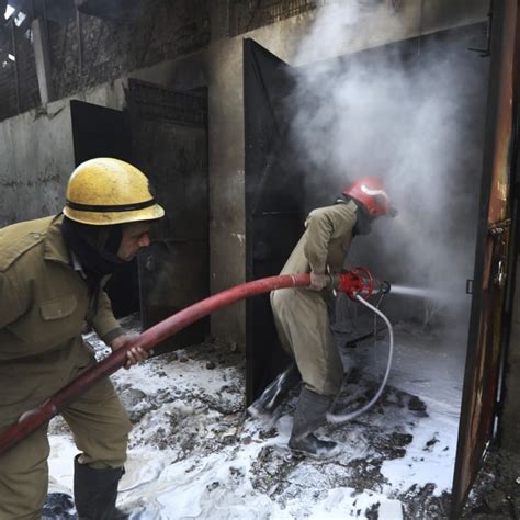 New Delhi Firefighter Killed 19 Injured As Battery Factory Collapses