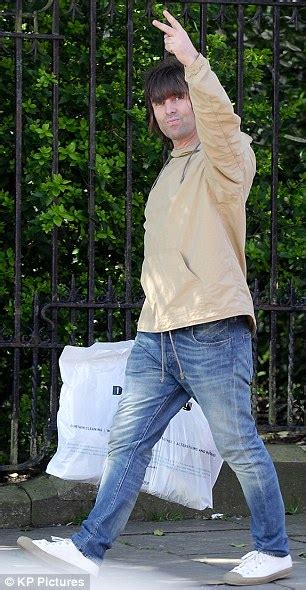 Liam Gallagher Gives Two Fingered Salute As He Runs Errands In London