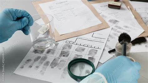 Forensic Fingerprint Analysis Criminalist Collects Latent Fingerprints