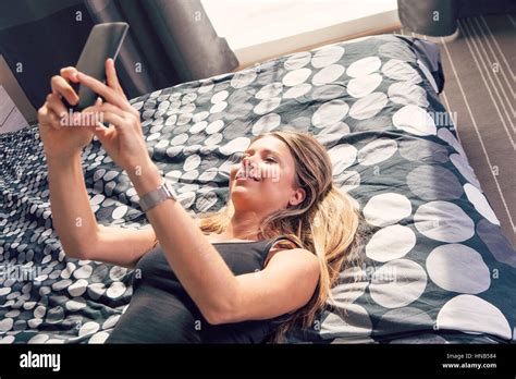 Gorgeous Blonde Lying On Bed Hi Res Stock Photography And Images Alamy