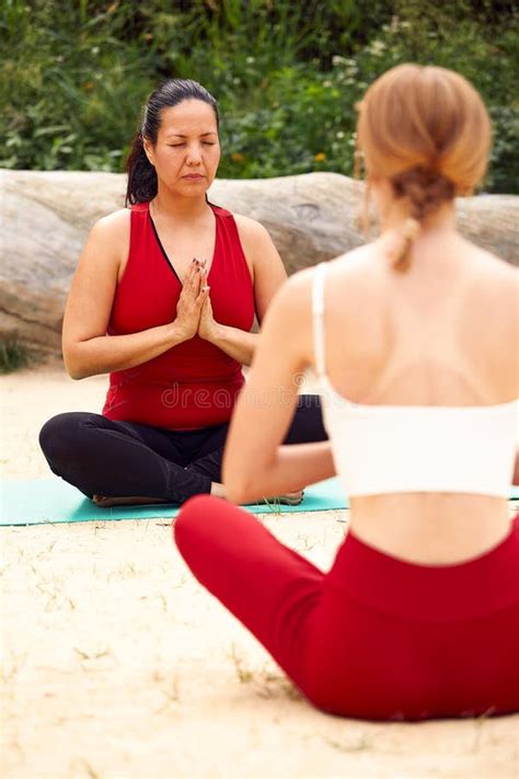 Two Girls Doing Yoga And Outdoor Meditation Pair Yoga Classes Healthy Lifestyle Meditation