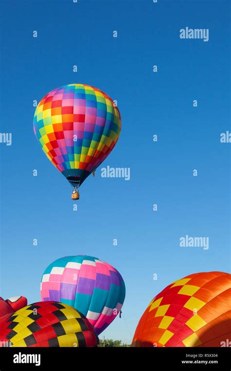 Hot Air Balloons Lifting Off Stock Photo Alamy