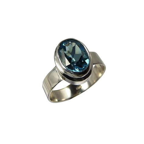 Bague Argent Et Topaze Bleue Ovale