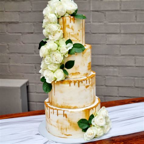 Naked Wedding Cake Tier With Flowers Baked By Nataleen