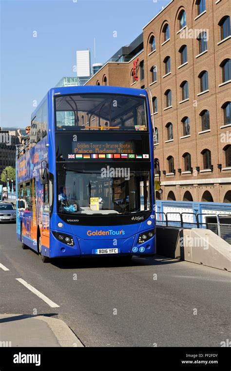 A double decker blue bus in London, UK Stock Photo - Alamy