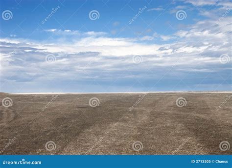 Blue sky and brown ground stock image. Image of pavement - 3713505