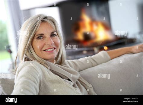 Portrait Mature Woman Sitting Fire Hi Res Stock Photography And Images