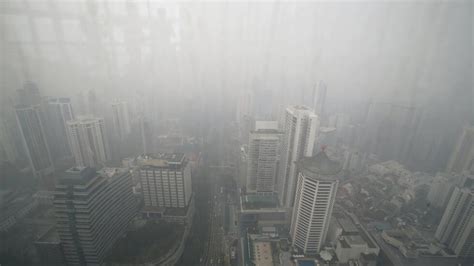 Singapour étouffe Sous Un épais Nuage De Pollution