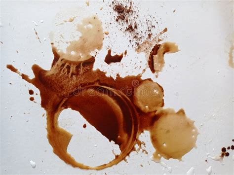 Splashes and Drops of Spilled Coffee on White Table Stock Photo - Image ...