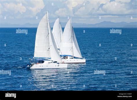 Three Sailboats Racing In The Indian Ocean Stock Photo Alamy