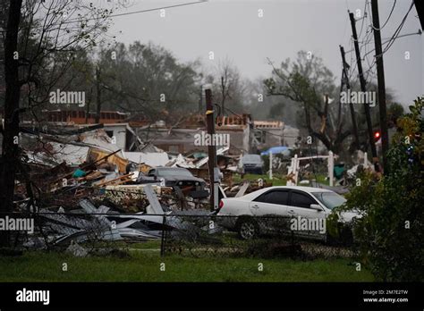 Vehicles And Debris Are Strewn About After A Tornado That Tore Through