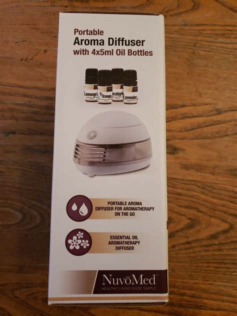 1 Nuvomed Portable Aroma Diffuser W 4x5ml Oil Bottles Ebay