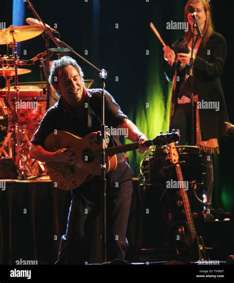 Bruce Springsteen performs in concert with members of the Seeger ...