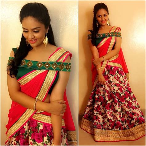 Sreemukhi In A Red Color Half Saree With Floral Design Sleeveless