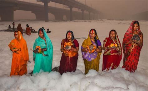 Devotees Stand Knee-Deep In Toxic Foam In Delhi's Yamuna For Chhath Puja