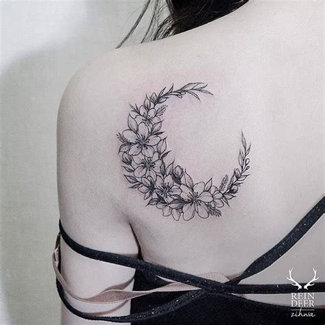 Moon Shaped Flower Wreath Tattoo On The Shoulder Blade