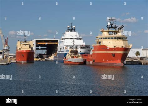 Tugs And Offshore Supply Ships Alongside In The Port Of Tampa Florida