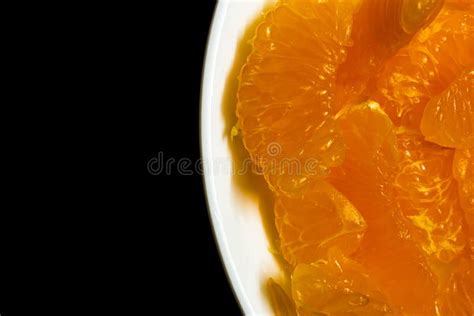 Peeled Orange Placed In A Plate Against Dark Background Use For Fruit