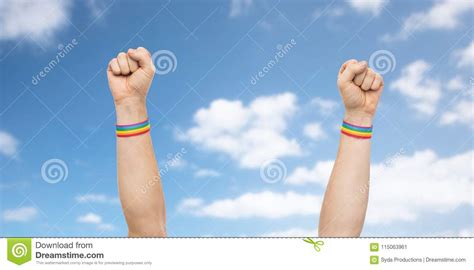 Hands With Gay Pride Rainbow Wristbands Shows Fist Stock Image Image