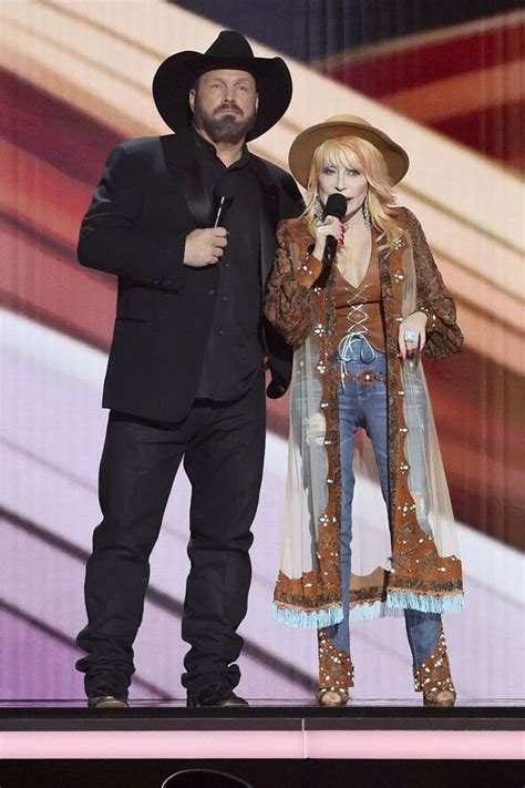 Dolly Parton puts on racy display with several outfit changes at ACM ...