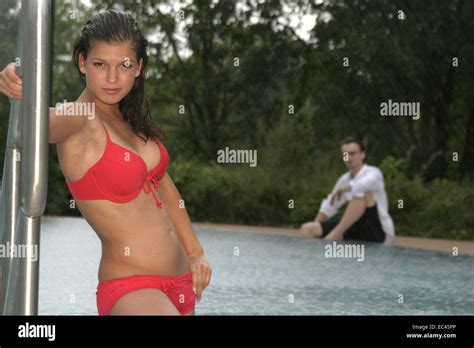 Man Looking At Woman Wearing Bikini Stock Photo Alamy