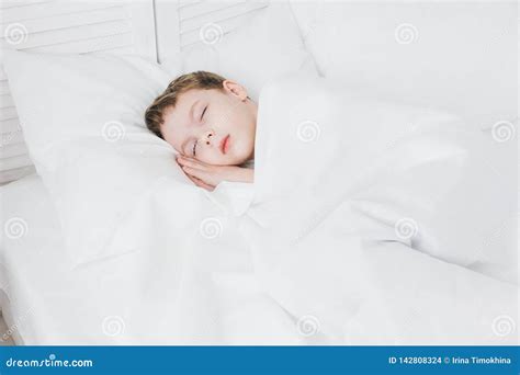 Cute Boy Sleeps In The Morning In Bed Stock Photo Image Of Sleep