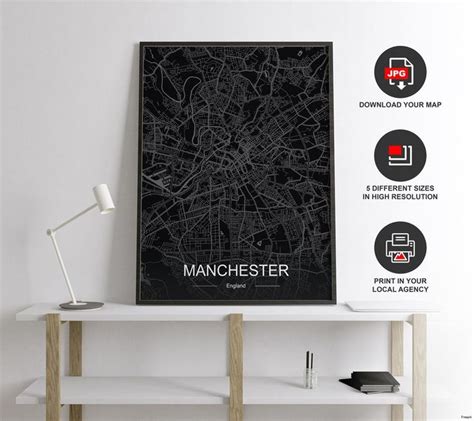 A Black And White Map Of Manchester England On A Shelf Next To A Lamp