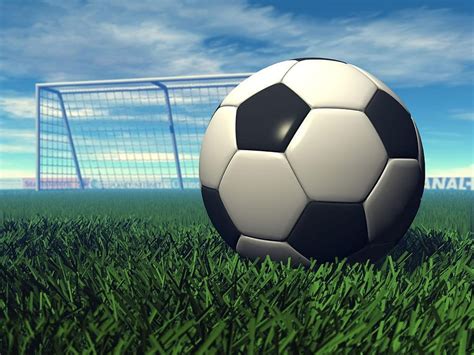 Soccer Ball On Grass Across White Goal Under Cloudy Sky During Daytime Hd Wallpaper Wallpaper