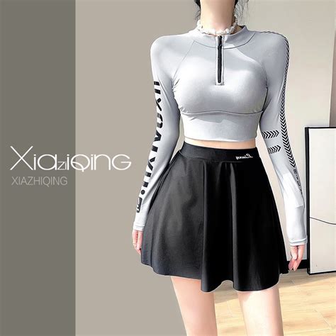 Đồ bơi nữ chân váy kín đáo tay dài chống nắng Bikini nữ hai mảnh đi biển dáng thể thao Shopee