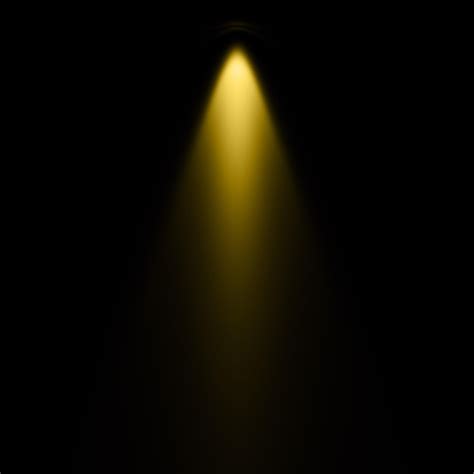 Premium Photo | Yellow spotlight of lighting with black background