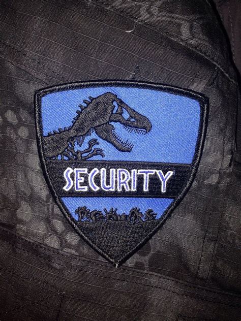 Jurassic World Acu Logo