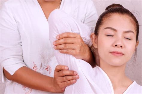 Hands Of Thai Masseuse Woman Getting Massage Barefoot For Customer