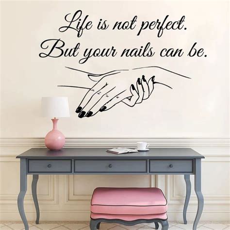 a wall decal that says life is not perfect but your nails can be