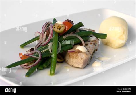 Grilled Tuna Served With Potato Mash Green Beans Spanish Onion