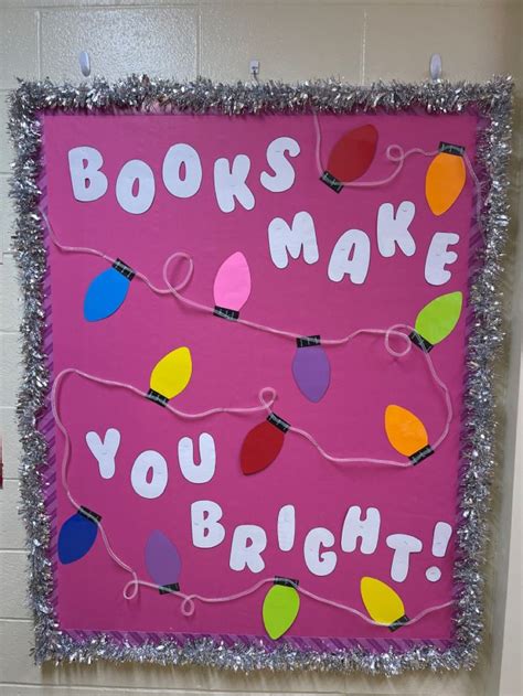 a bulletin board that says books make you bright with lights on it and ...