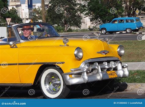 Classic Yellow Car With White Wall Tires In Havana Editorial