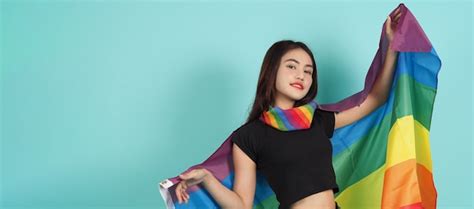 Premium Photo Lgbtq Girl And Pride Flag Sexy Lesbian Girl And Lgbt Flag Standing Blue Green