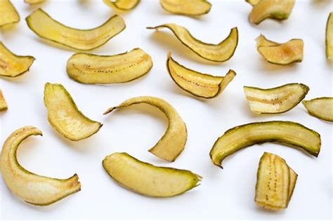 Premium Photo | Green banana chips with peel