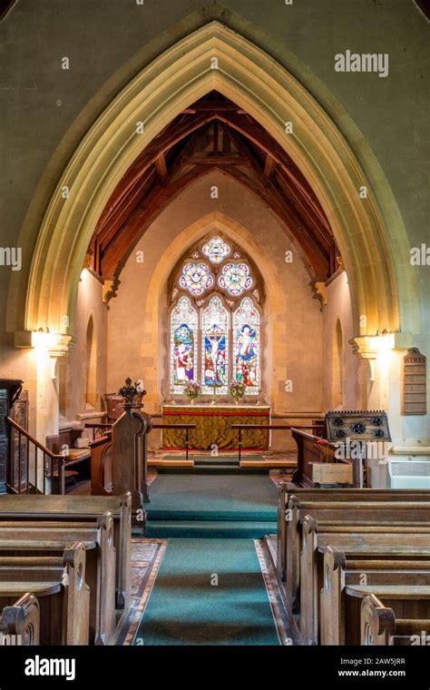 Stained Glass Window Apse Pulpit And Gothic Architecture Of Saint