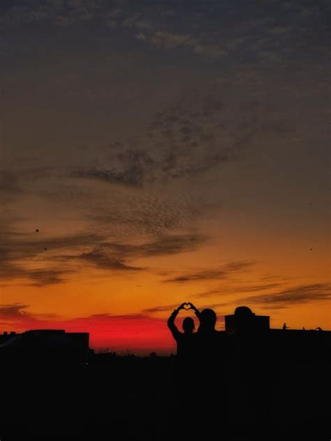 Silhouette of Building during Sunset · Free Stock Photo