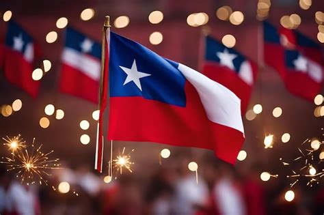 Una bandera con una estrella blanca está volando en el aire Foto Premium